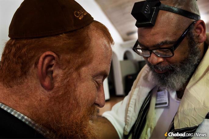 Chabad Rabbi David Goldstein is the head rabbi for the Texas Department of Criminal Justice, but Asnin says “he’s genuinely there more as a friend.&quot; - Photo by Marc Asnin