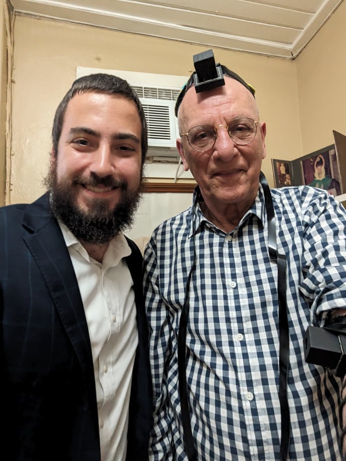 Rabbi Super lays tefillin on Dr. Joey Jagan, son of former Guyana presidents Cheddi and Janet Jagan, icons of Guyana. It was Jagan's first time wearing tefillin. - Photo: Chabad of St. Lucia