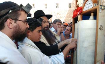 Nadav Elharar is called, for the first time in his life, to recite the blessings over the Torah scroll
