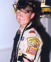 A Jewish Boy Scout proudly wearing tefillin