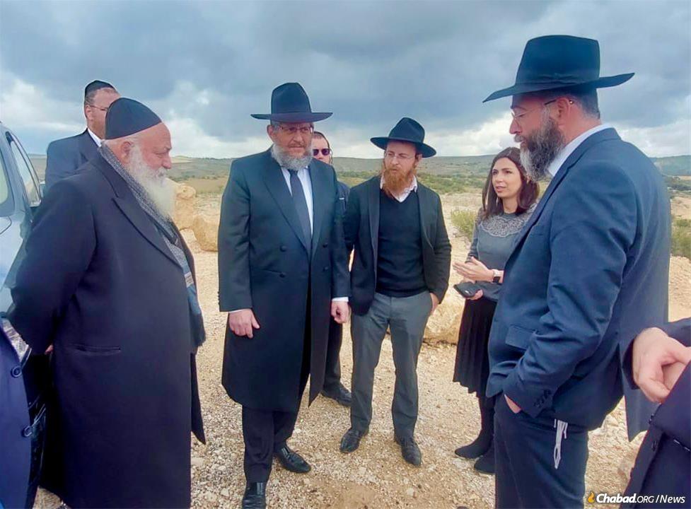 From left: Israeli Minister of Housing Yitzchak Goldknopf; Rabbi Yosef Yitzchak Aharonov, chairman of Tzierei Agudas Chasidei Chabad in Israel; co-directors Rabbi Mendy and Bruria Efune; and CEO of Agudas Chassidei Chabad in Israel Rabbi Ariel Lemberg. - Ohr Chabad