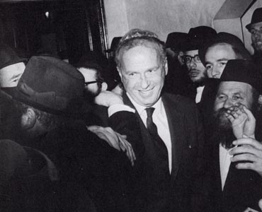 Yitzhak Rabin participates in a jubilant dance after emerging from his audience with the Rebbe. 
 
Photo: Isaac Berez