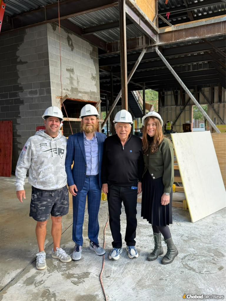 The Uminers with Robert Kraft and Daniel Kraft at the site.