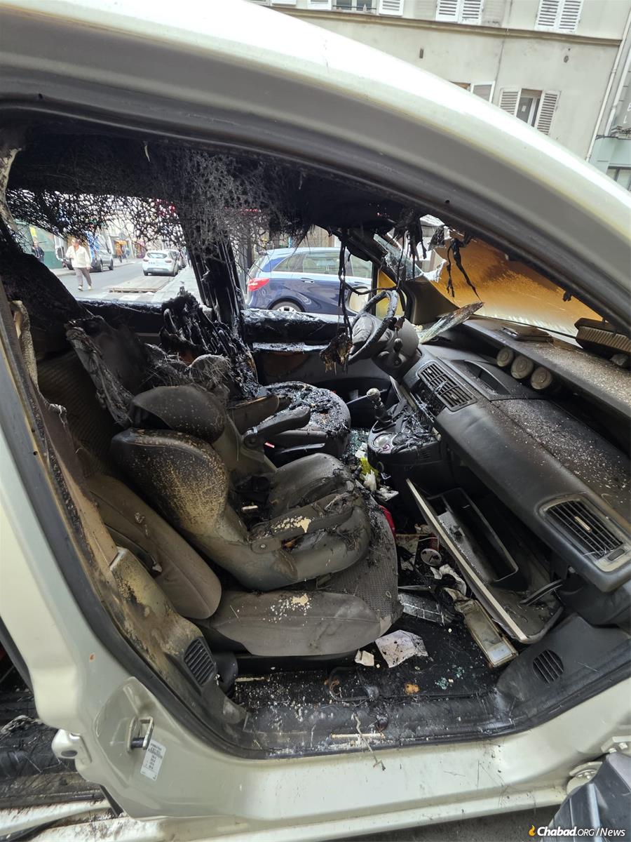 The Cohen's car had its windown broken and burnt from the inside, totally destroying it.