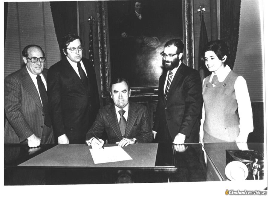 With Governor of New York Hugh Carey in Albany.