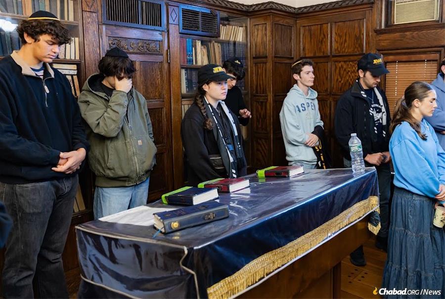 Students pray in the Rebbe's study at Chabad World Headquarters. - Chabad on Campus International