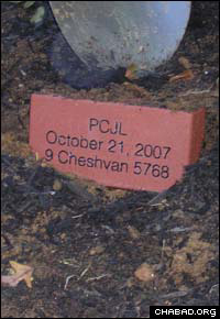 A ceremonial cornerstone marks the site of the future Perelman Center for Jewish Life at the University of Pennsylania.