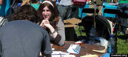 Bracha Sara Leeds sits down with a student at the University of California at Berkeley.