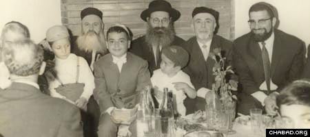 Rabbi Shlomo Matusof, third from right, and his family sit down with Sephardic Jewish leaders in Morocco, including, left, Rabbi Shalom Messas, who then was chief rabbi of Casablanca, and later became chief rabbi of Morocco and chief Sephardic rabbi of Jerusalem.