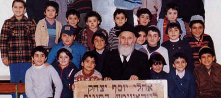 Rabbi Nisson Pinson with students at the Lubavitch day school in Tunis