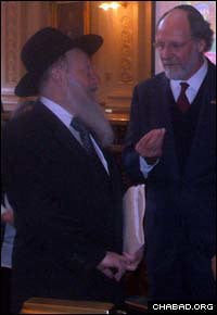 Chabad-Lubavitch Rabbi Moshe Herson, left, dean of the Rabbinical College of America, shares a moment with New Jersey Gov. Jon Corzine, during a Tuesday night Chanukah celebration at the State House in Trenton.