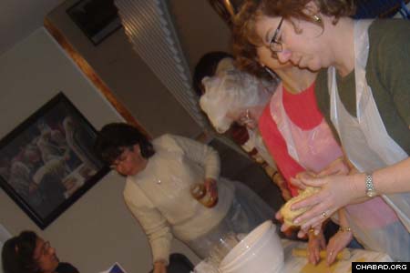 Baking hamentashen, the traditional Purim treat.