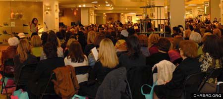 Jewish women from across Toronto pack The Bay department store in the city’s Yorkdale shopping center for a fashion show highlighting the best in modest apparel.