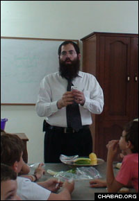  Rabbi Shimon Pelman, co-director of the just-established Chabad-Lubavitch of the Dominican Republic, teaches a class to children of the local Jewish community.