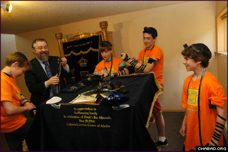 A concluding fun day began with laying tefillin for the post-bar mitzvah boys, who prayed the morning service with Rabbi Yosef Greenberg, director of the Chabad-Lubavitch Jewish Center of Alaska.