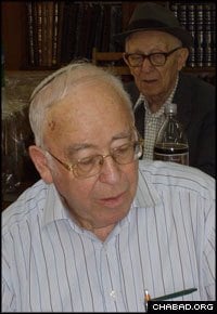 Retired journalist Chaim Pyekrash, 76, learns a section of the Talmud.