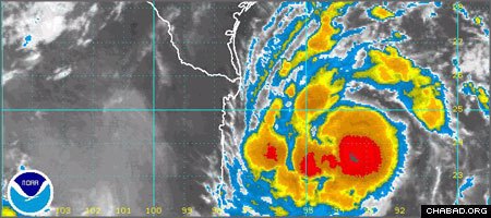 A satellite image taken at 6:45 local time shows the approaching Tropical Storm Dolly, which is expected to strengthen into a hurricane before slamming into the Mexican and Texan coasts. (NOAA)