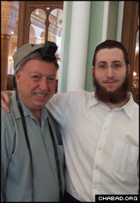Rabbinical student Mordechai Lightstone, right, with a Persian Jew from Los Angeles in the central synagogue of S. Petersburg, Russia