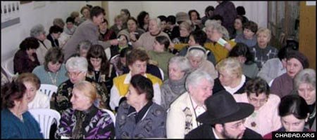 Members of the Jewish community of Brest, Belarus, hold a meeting.
