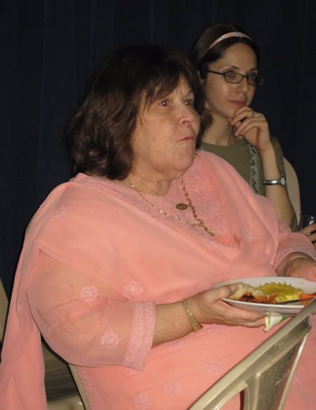 The grandmother of the Bar Mitzvah boy sitting next to Rivki