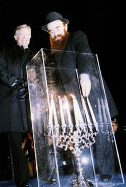 President Jimmy Carter at the Lubavitch Menorah Lighting in front of the White House together with Rabbi Abraham Shemtov, national director of American Friends of Lubavitch and the Rebbe&#39;s ambassador to the White House.