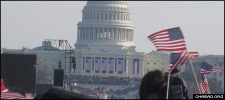 Some two million people filled the Mall between the Washington Memorial and the west front of the U.S. Capitol to watch President Barack Obama take the oath of office Tuesday. (Photo: BBC World Service)