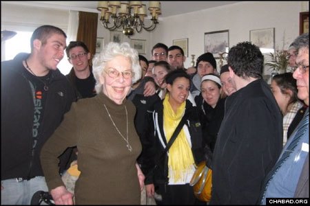 Students visit with a Jewish resident of Berlin.