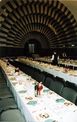 The Golden Rose Synagogue all set up for a public seder. (This picture is not fromn this past year. When I was there, the room was set up with many smaller round tables)