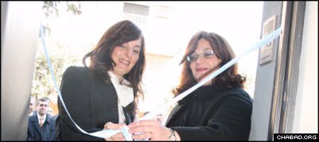 Miriam Levy, left, and Malka Maleh of Chabad-Lubavitch of Tucum&#225;n cut the ceremonial ribbon at the grand opening of the province’s new medical center and Jewish ritual bath.