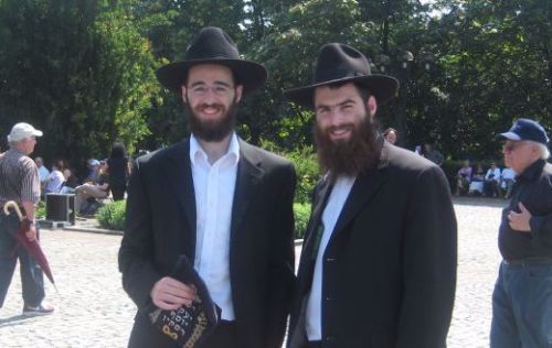 Tefillin in hand, Dovid Blecher and Yaakov Yosef Raskin are ready to rove!