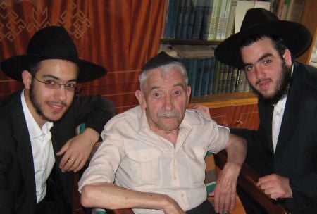 With Uncle Fima who speaks Yiddish.