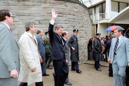 President Reagan waves to crowd, as he leaves the Hilton Hotel, immediately before being shot in an assassination attempt. (The Reagan Library)