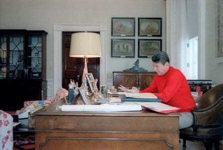 President Reagan working in his residence study on April 15th, the day he wrote the letter to the Rebbe. (The Reagan Library)