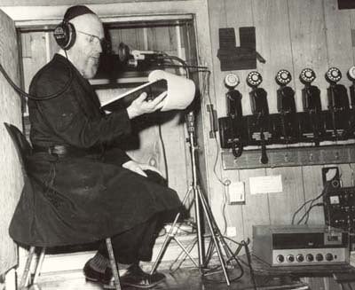 Rabbi J.J. Hecht in the recording room during his weekly radio show, which commenced in the early 1950s