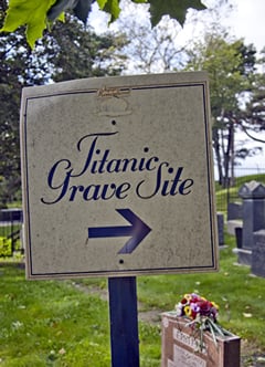 A simple sign points the way to the small section of a Jewish cemetery where victims of the Titanic are buried.