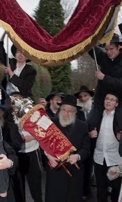 Dancing with the Torah in Manchester.