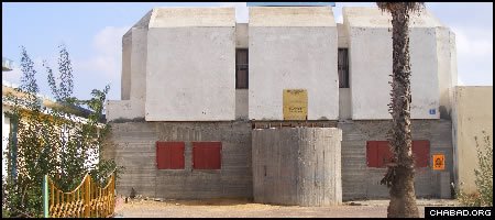 With its reinforced concrete walls, the Chabad-Lubavitch center in Sderot, Israel, looks more like a bomb shelter than a synagogue, a sign of the times in the border town. (Photo: Andrew Friedman)