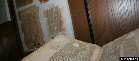 Centuries-old pages from one of the first printed copies of the Talmud, part of the collection of the Chabad-Lubavitch library in New York, are among artifacts featured in a new book from the Kehot Publication Society.