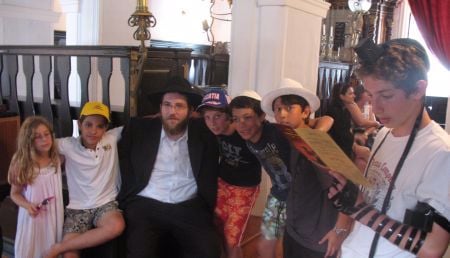 With a group of Jewish kids in the ancient synagogue.
