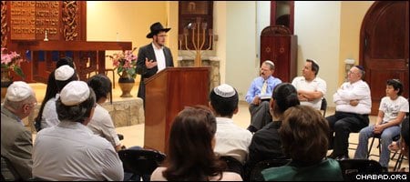 A Chabad-Lubavitch rabbinical student leads a Torah class for Jewish residents of Tegucigalpa, Honduras, as part of the summer program colloquially known as the “Roving Rabbis.”