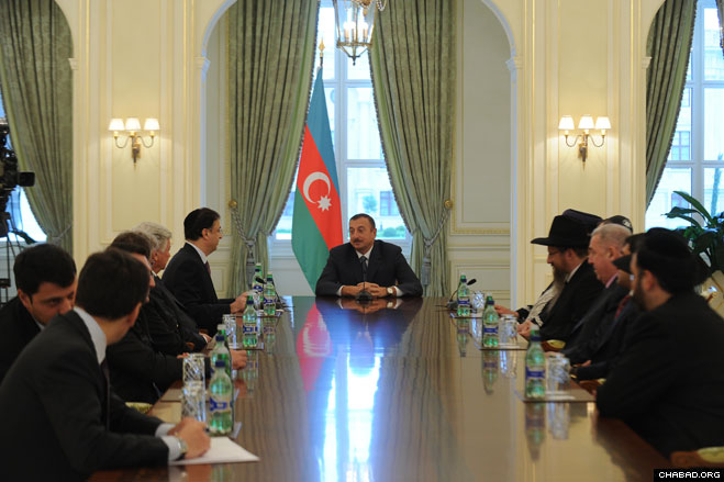 Businessman and President of the Federation of Jewish Communities in the CIS Lev Leviev addresses Azerbaijani President Ilham Aliyev at a meeting prior to the grand opening of the new Chabad Ohr Avner day school in Baku.