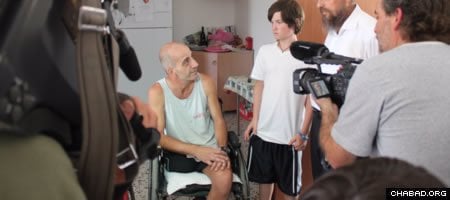 Tyler Hochman was followed by Israeli media as he delivered wheelchairs to organizations and needy individuals this summer.