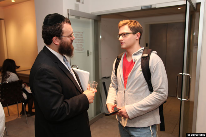 Rabbi Dovid Tiechtel, co-director of the Chabad Center for Jewish Life serving the University of Illinois at Urbana-Champaign, greets a participant at the National Leadership Conference of Chabad on Campus.