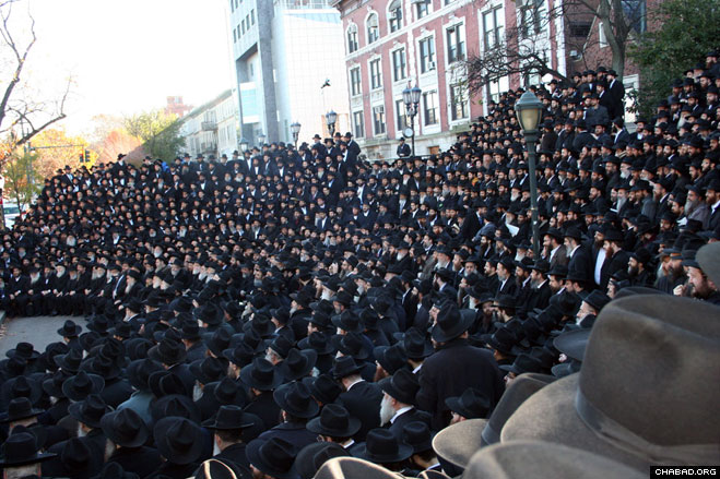 Thousands of Chabad-Lubavitch emissaries from more than 76 countries arrived in Brooklyn, N.Y., for their annual conference. They gathered Sunday morning in front of Lubavitch World Headquarters for the traditional group photograph.