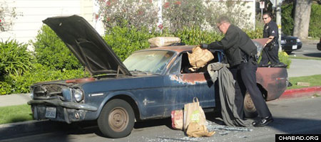 A suspicious car thought to have belonged to synagogue bombing suspect Ron Hirsch was found on Armacost Ave., just north of Nebraska Ave. in West Los Angeles. Police later determined that the car did not belong to Hirsch. (Photo: Kurt Orzeck/Santa Monica Patch)