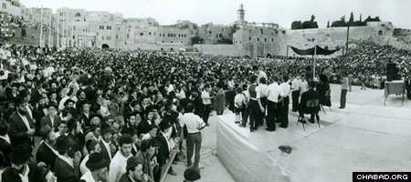 Thousands celebrate the completion of the first Children’s Torah Scroll at the Western Wall in Jerusalem.