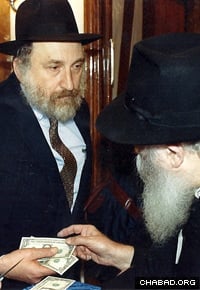 Yaacov Hanoka, left, treasured the advice he received from the Rebbe, Rabbi Menachem M. Schneerson, of righteous memory.