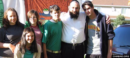 Rabbi Benny Zippel, second from right, directs Chabad-Lubavitch of Utah and its Project HEART, a program that provides Jewish connections to children in residential treatment centers.