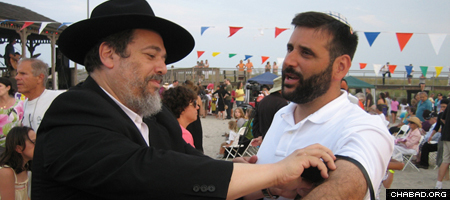 Jewish opportunities, such as donning the prayer boxes known as tefillin, abound at Atlantic City’s annual summer festival hosted by Chabad-Lubavitch at the Shore.