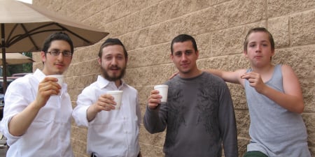 Toasting to the bar mitzvah at the gas station.
